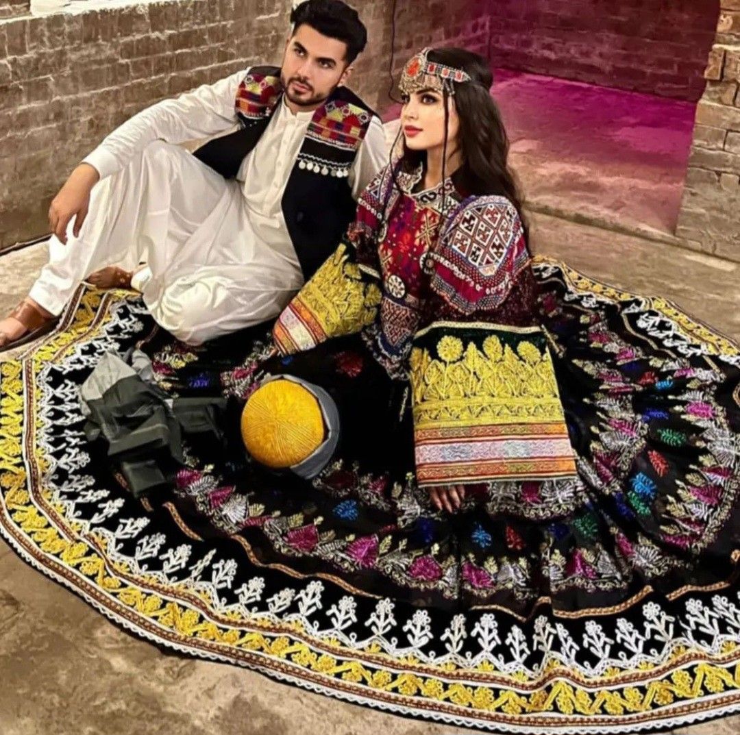Afghan couple in traditional wedding attire
